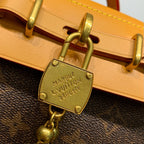 STEAMER 20 IN BRAUNEM MONOGRAMM-STAUB-CANVAS UND KALBSLEDERBEZIERTEN GOLDENEN HALSBÄNKEN