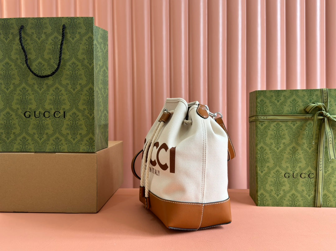 DRAWSTRING SHOULDER BAG LOGO PRINT 31 IN WHITE CANVAS BROWN CALFSKIN