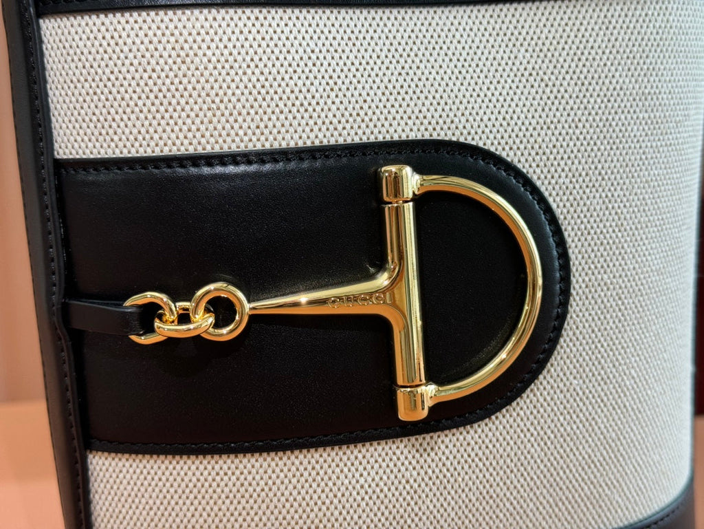 73 SMALL BUCKET BAG 20 IN NATURAL CANVAS AND BLACK CALFSKIN