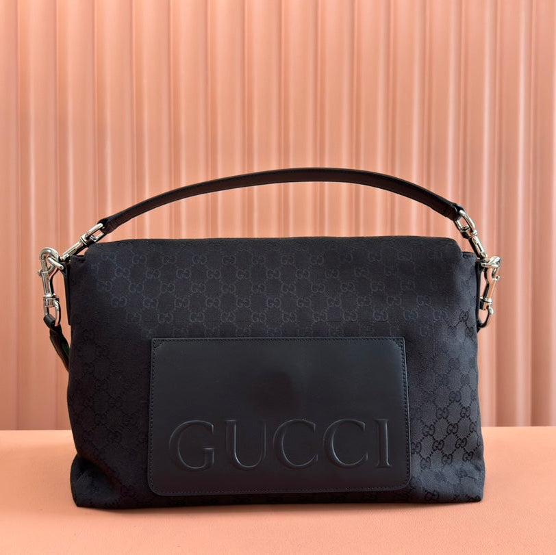 GROSSE UMHÄNGETASCHE 36 IN SCHWARZEM CANVAS