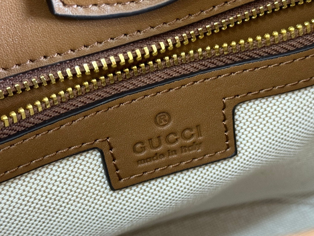 73 SMALL BUCKET BAG 20 IN BROWN SOFT SUEDE AND CALFSKIN