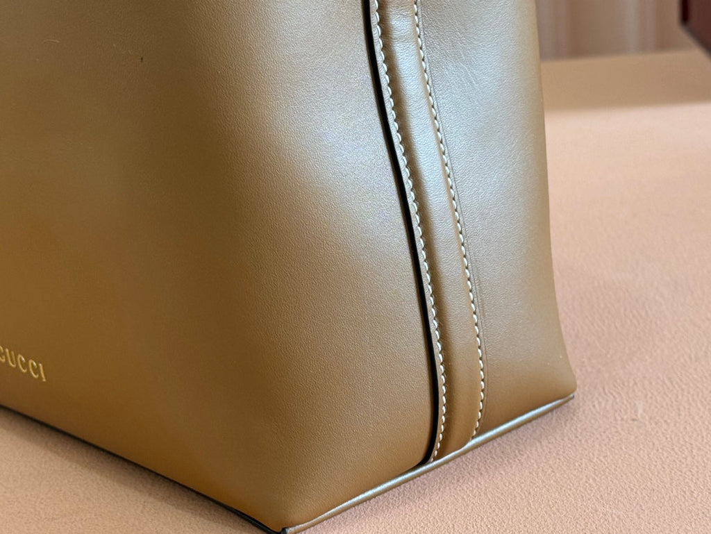 EMBLEM SMALL BUCKET BAG 19 IN BROWN SMOOTH CALFSKIN