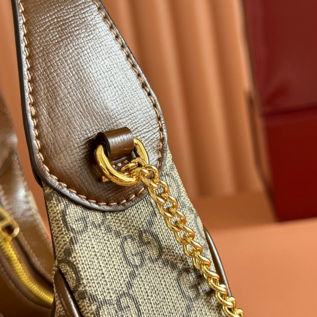 GG SUPREME SHOULDER BAG 22 BROWN IN CANVAS GOLD HARDWARE