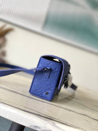 STEAMER 18 IN SAPPHIRE BLUE MONOGRAM EMBOSSED TAURILLON