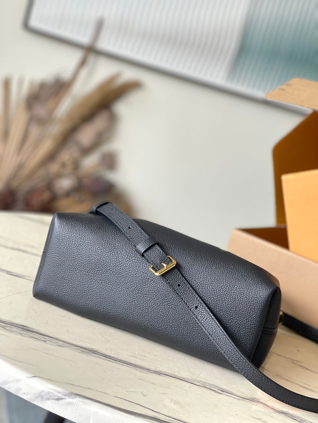 Bundle 28 in schwarzem Monogramm Empreinte Leder goldene Beschläge