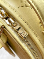 MINI BOITE CHAPEAU 13 IN BANANA YELLOW MONOGRAM PERFORATED CALFSKIN