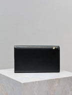 UPTOWN WALLET 21 IN BLACK CALFSKIN GOLD LOGO