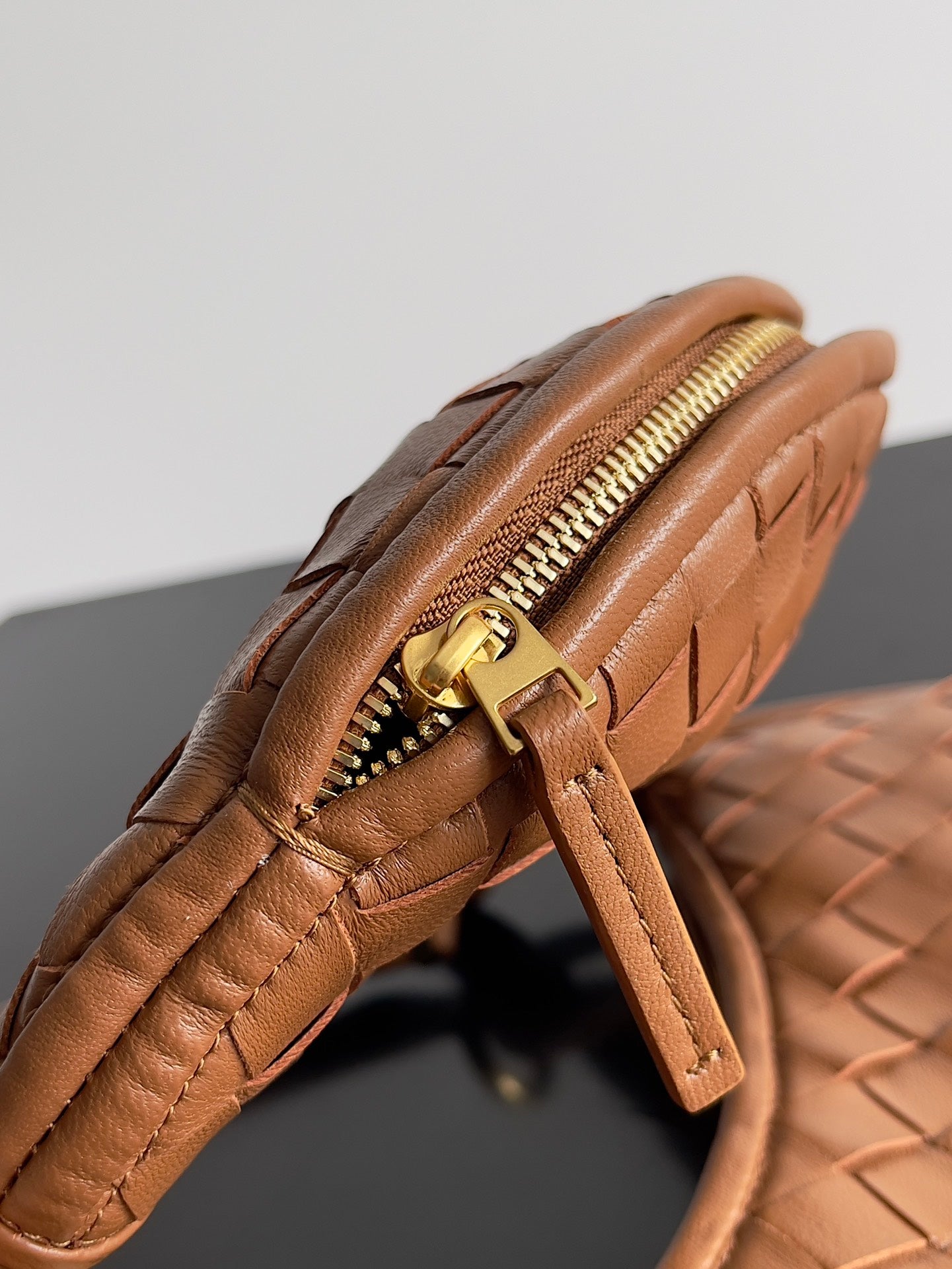 KLEINE GEMELLI 24 IN BRONZEBRAUN LAMMFELL