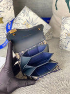 SADDLE LOTUS WALLET 11 IN BLACK MONOGRAM OBLIQUE JACQUARD